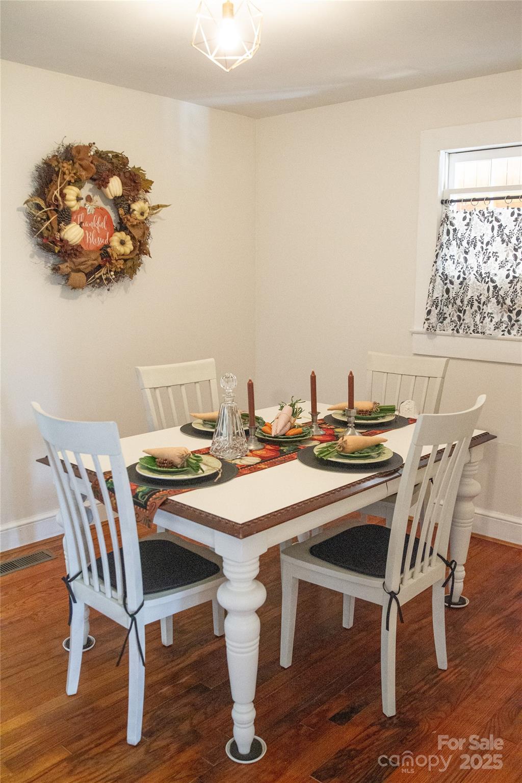 607 Fred Sparks Road Bakersville, NC 28705 - Photo 20 of 41 a kitchen with a table and chairs