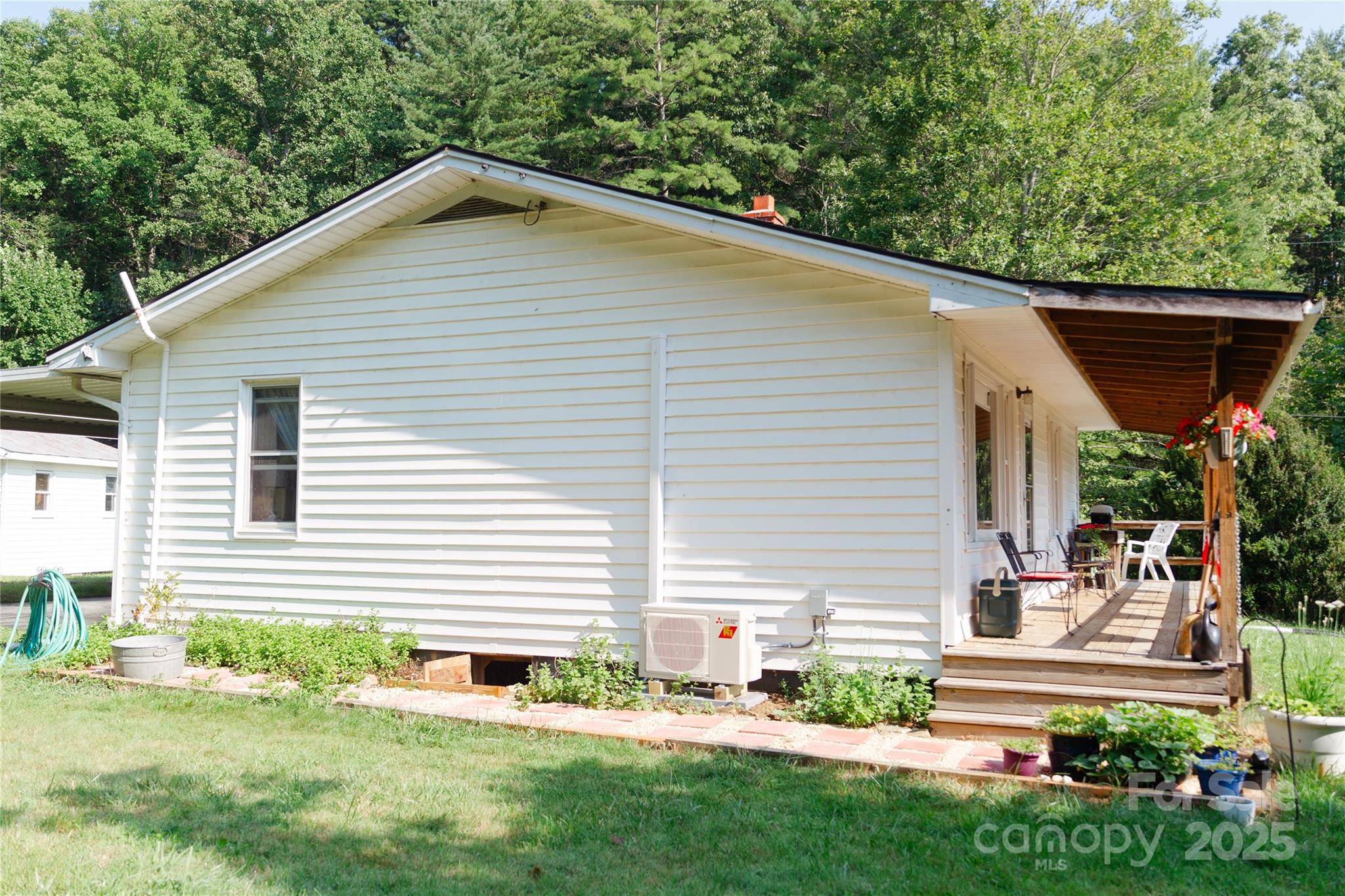 607 Fred Sparks Road Bakersville, NC 28705 - Photo 28 of 41 a front view of a house with a yard