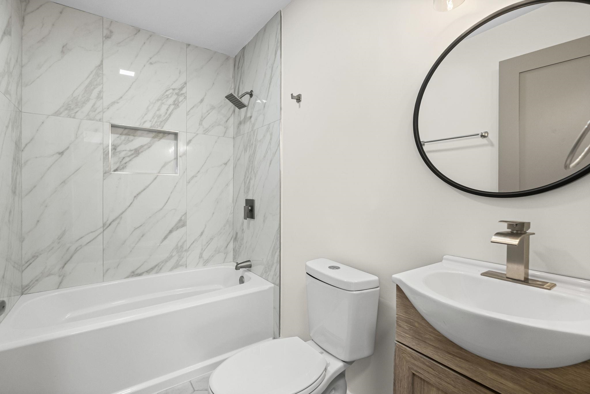 4774 Montgomery Road Millington, TN 38053 - Photo 12 of 20 Full bath with bathing tub / shower combination and vanity