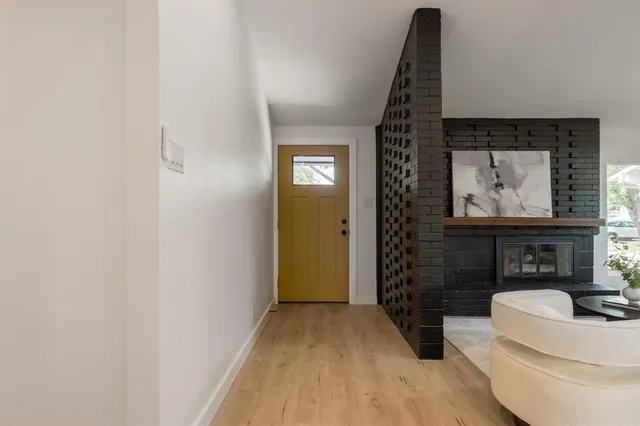 a view of a livingroom with furniture and window