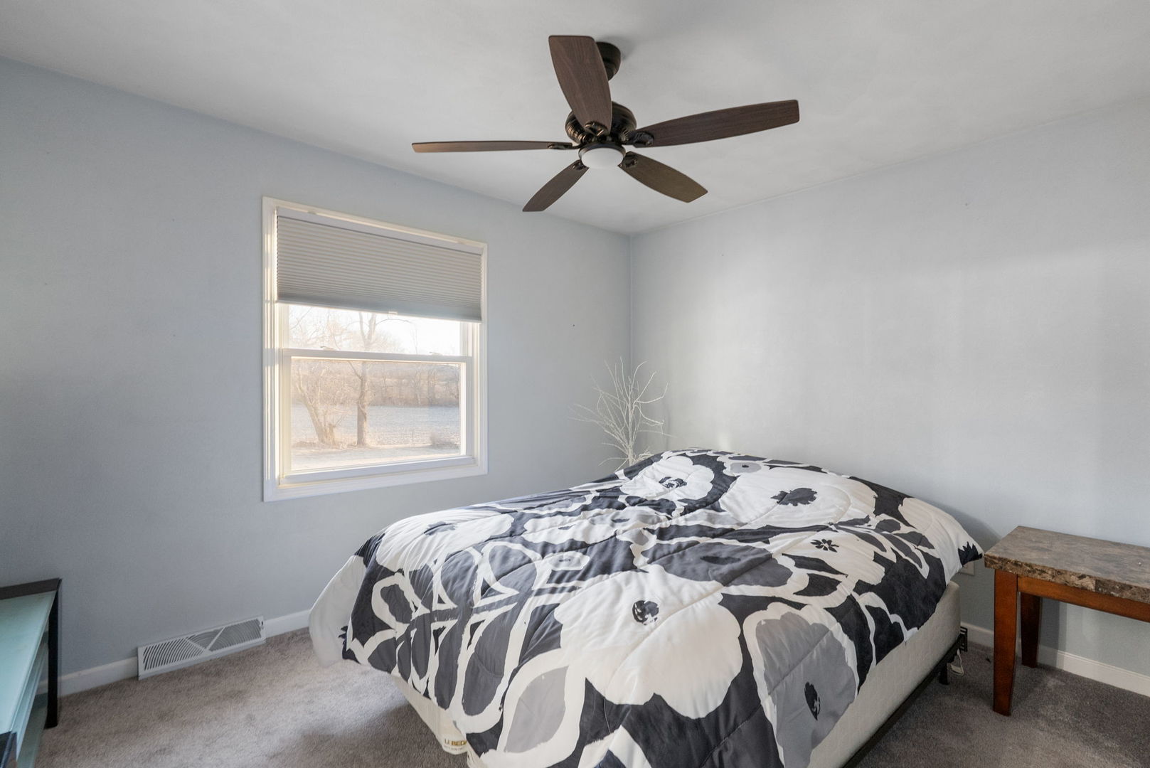 712 Fairfield Road Port Byron, IL 61275 - Photo 11 of 45 a bedroom with a bed and a window