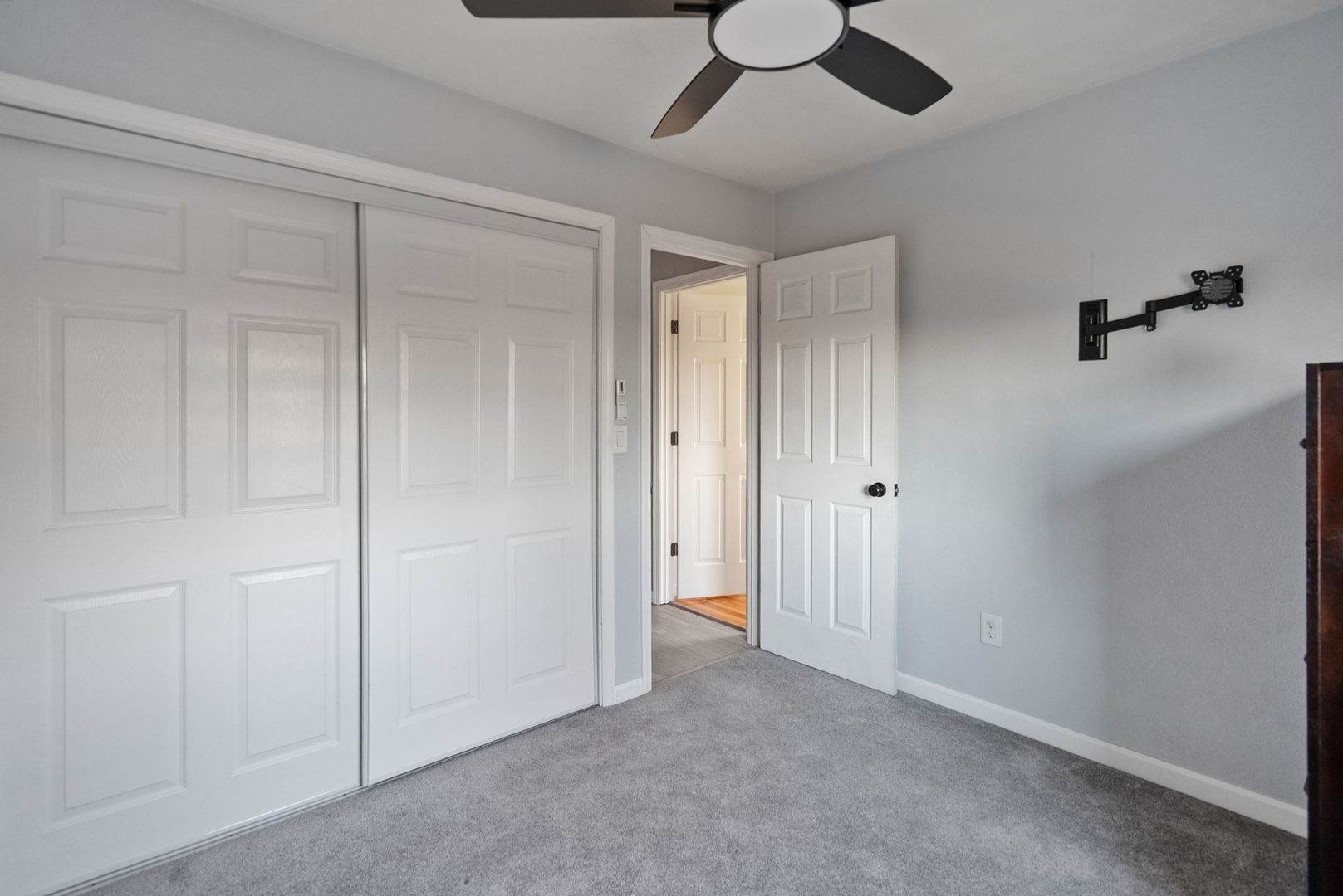 712 Fairfield Road Port Byron, IL 61275 - Photo 16 of 45 a view of a livingroom with a chandelier fan