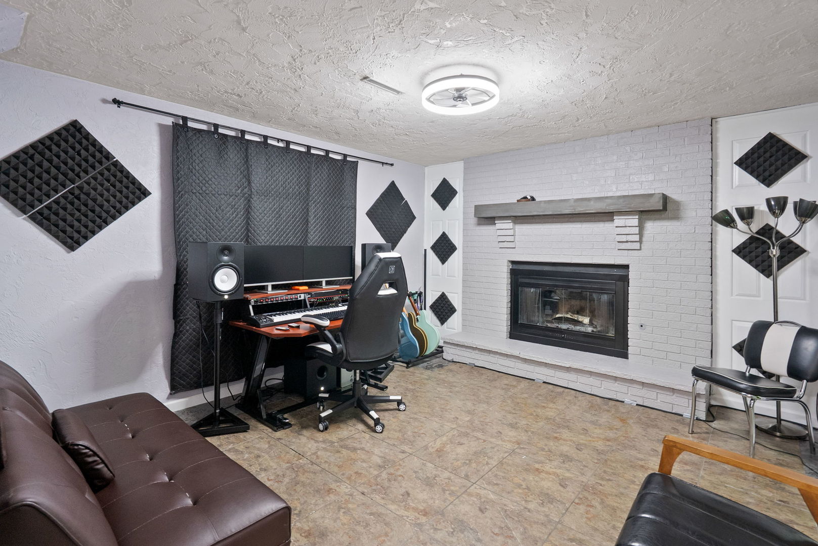 712 Fairfield Road Port Byron, IL 61275 - Photo 23 of 45 a living room with furniture and a fireplace
