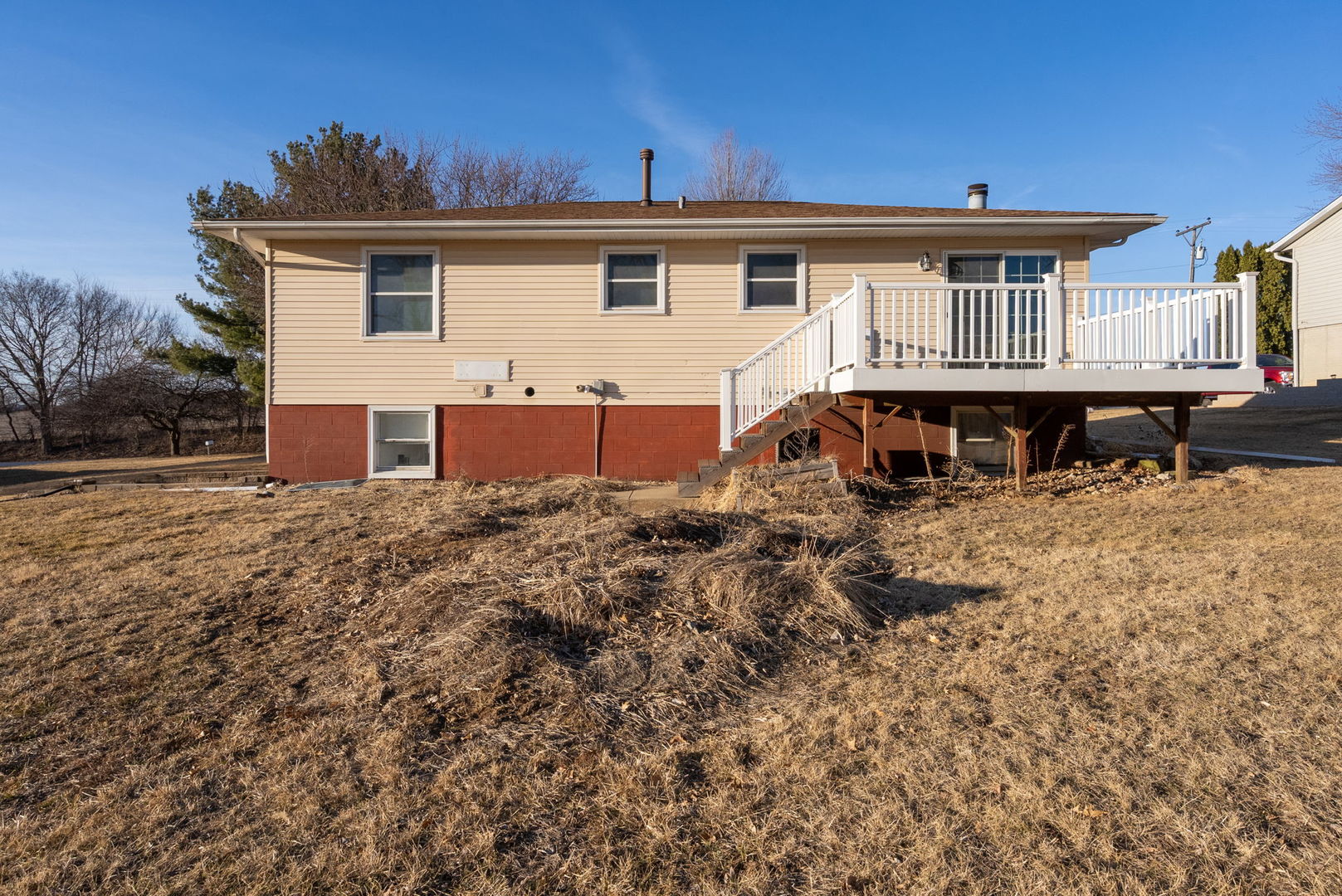 712 Fairfield Road Port Byron, IL 61275 - Photo 31 of 45 a front view of a house with a yard