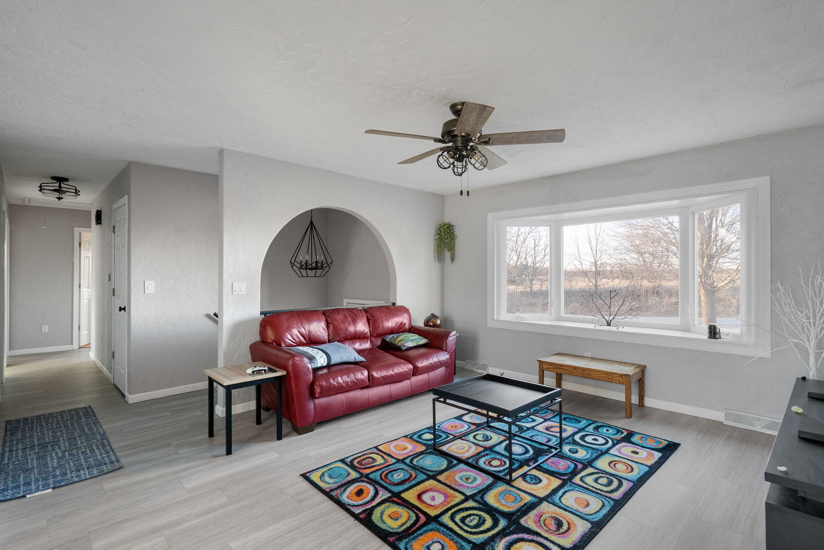 712 Fairfield Road Port Byron, IL 61275 - Photo 4 of 45 a living room with furniture and a rug