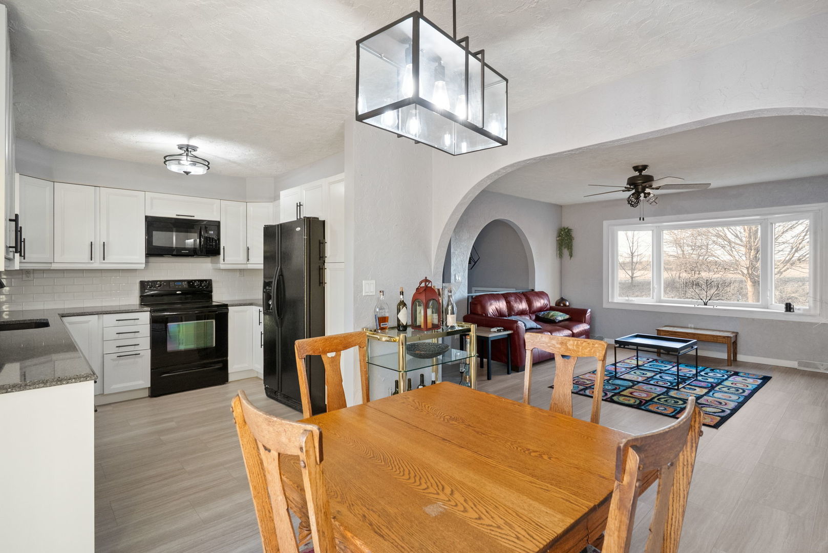 712 Fairfield Road Port Byron, IL 61275 - Photo 8 of 45 a kitchen that has a lot of cabinets in it