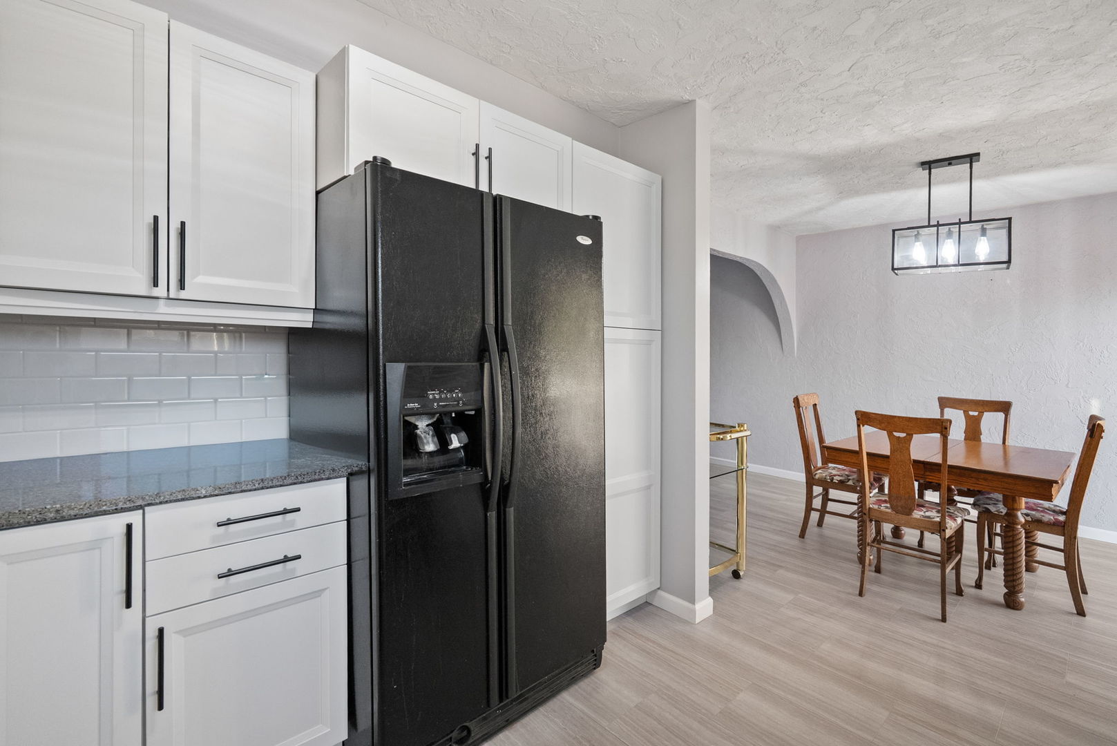 712 Fairfield Road Port Byron, IL 61275 - Photo 10 of 45 a kitchen with stainless steel appliances granite countertop a refrigerator and a stove top oven