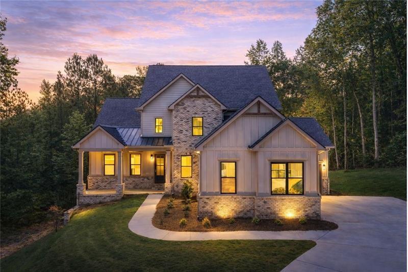 7262 Creekside Way Jefferson, GA 30549 - Photo 2 of 52 a front view of a house with yard