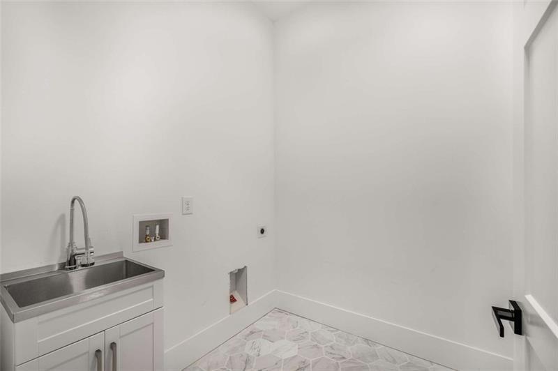 7262 Creekside Way Jefferson, GA 30549 - Photo 27 of 52 a bathroom with a sink and vanity