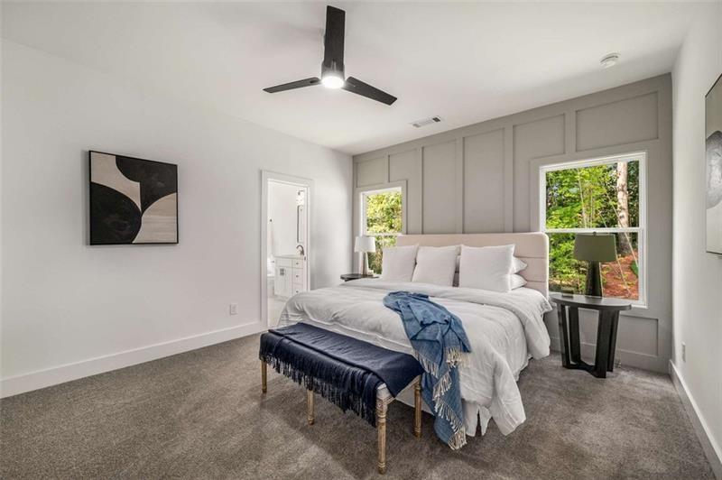 7262 Creekside Way Jefferson, GA 30549 - Photo 28 of 52 a bed room with a bed and a television