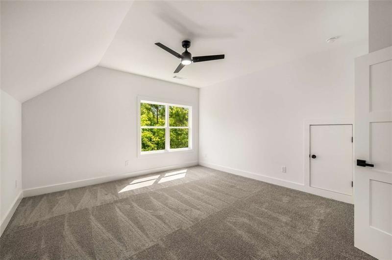 7262 Creekside Way Jefferson, GA 30549 - Photo 32 of 52 an empty room with windows