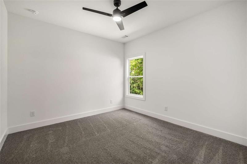 7262 Creekside Way Jefferson, GA 30549 - Photo 36 of 52 an empty room with windows
