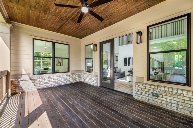7262 Creekside Way Jefferson, GA 30549 - Photo 37 of 52 a view of an empty room with wooden floor and a window
