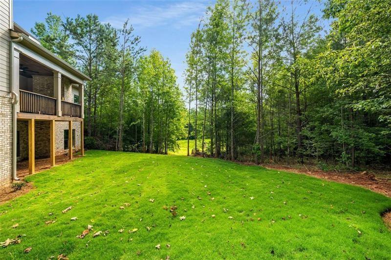 7262 Creekside Way Jefferson, GA 30549 - Photo 42 of 52 a view of a backyard with a garden