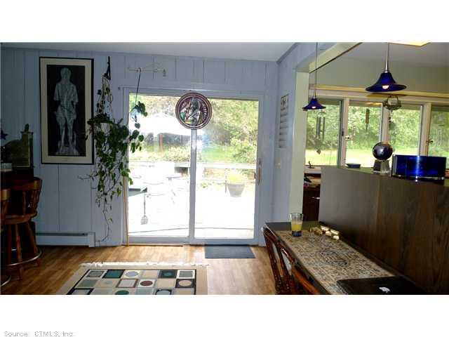 302 Hickory Hill Road Thomaston, CT 06787 - Photo 1 of 1 Kitchen. Deck sliders from kitchen breakfast and bar area