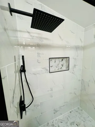 a picture of a room with gym equipment