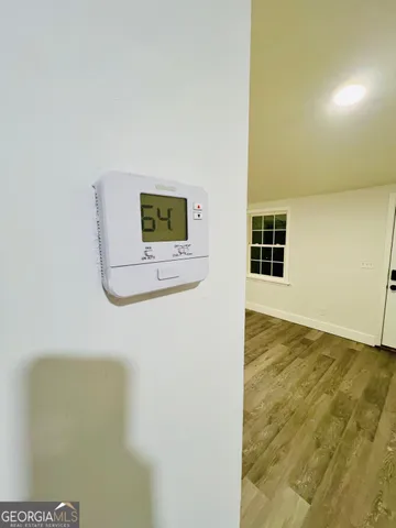 a view of a livingroom with wooden floor