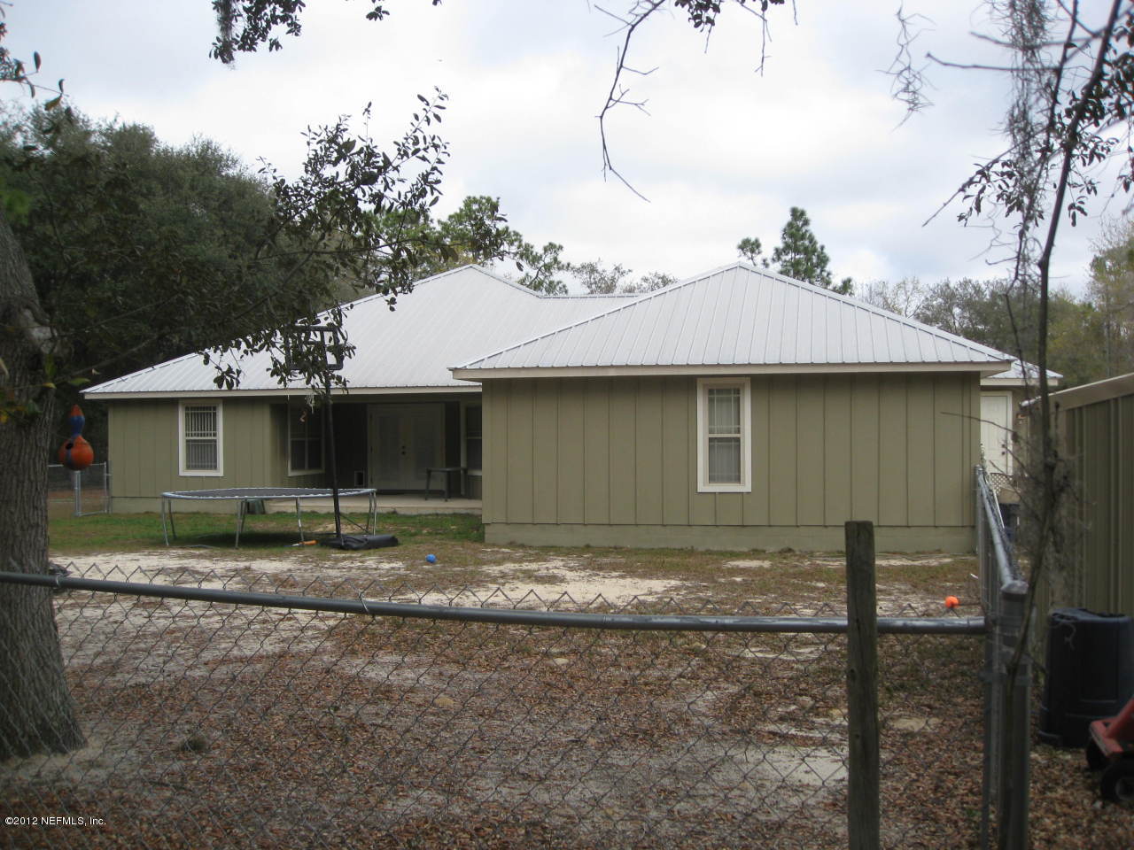7023 Elfo Road Keystone Heights, FL 32656 - Photo 2 of 12 a view of a house with backyard