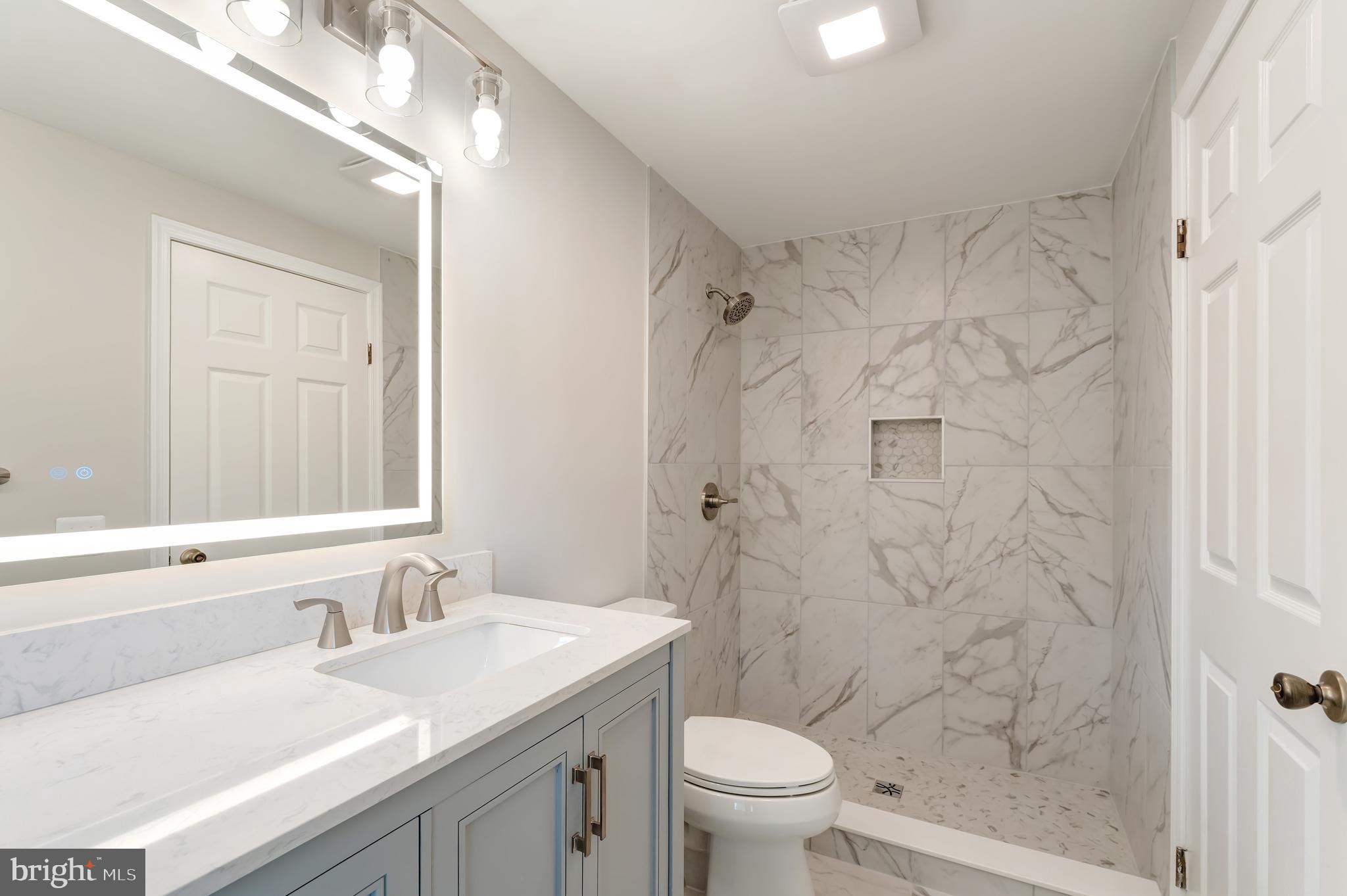 1330 Rock Chapel Road Herndon, VA 20170 - Photo 28 of 41 OWNER'S BA-WALK-IN SHOWER, NEW COMMODE, TILE FLOOR