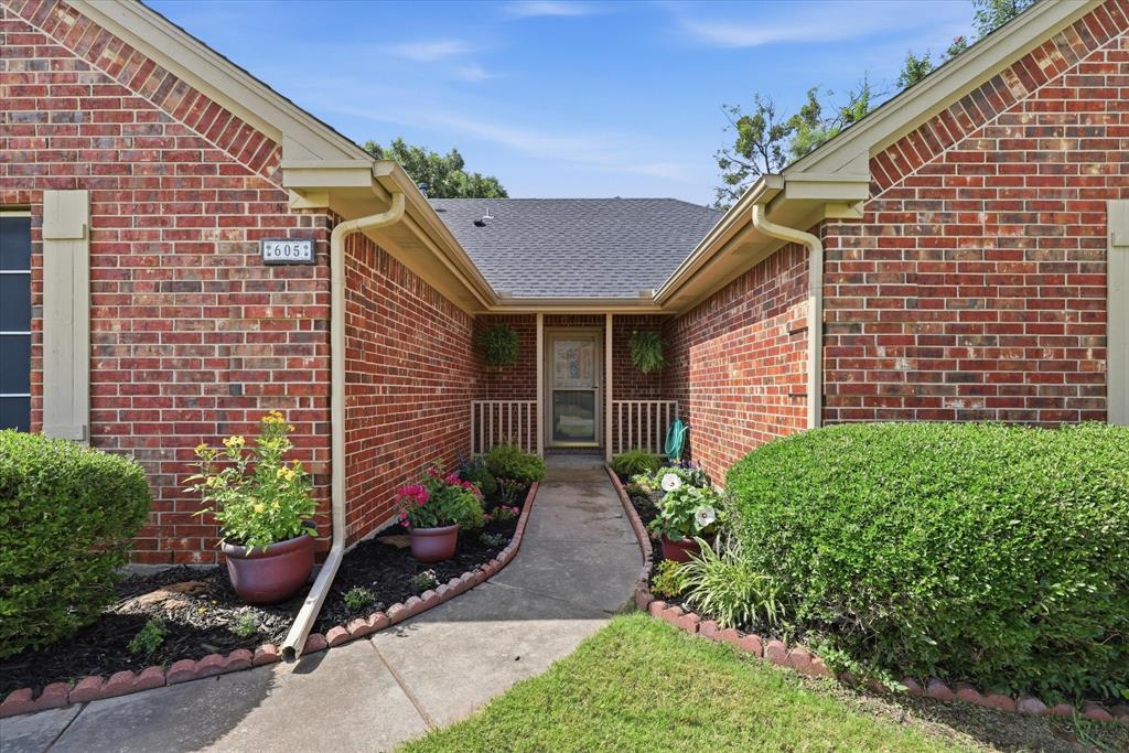 605 Maple Drive Pilot Point, TX 76258 - Photo 6 of 38 Beautiful Landscaping welcomes you to the front door