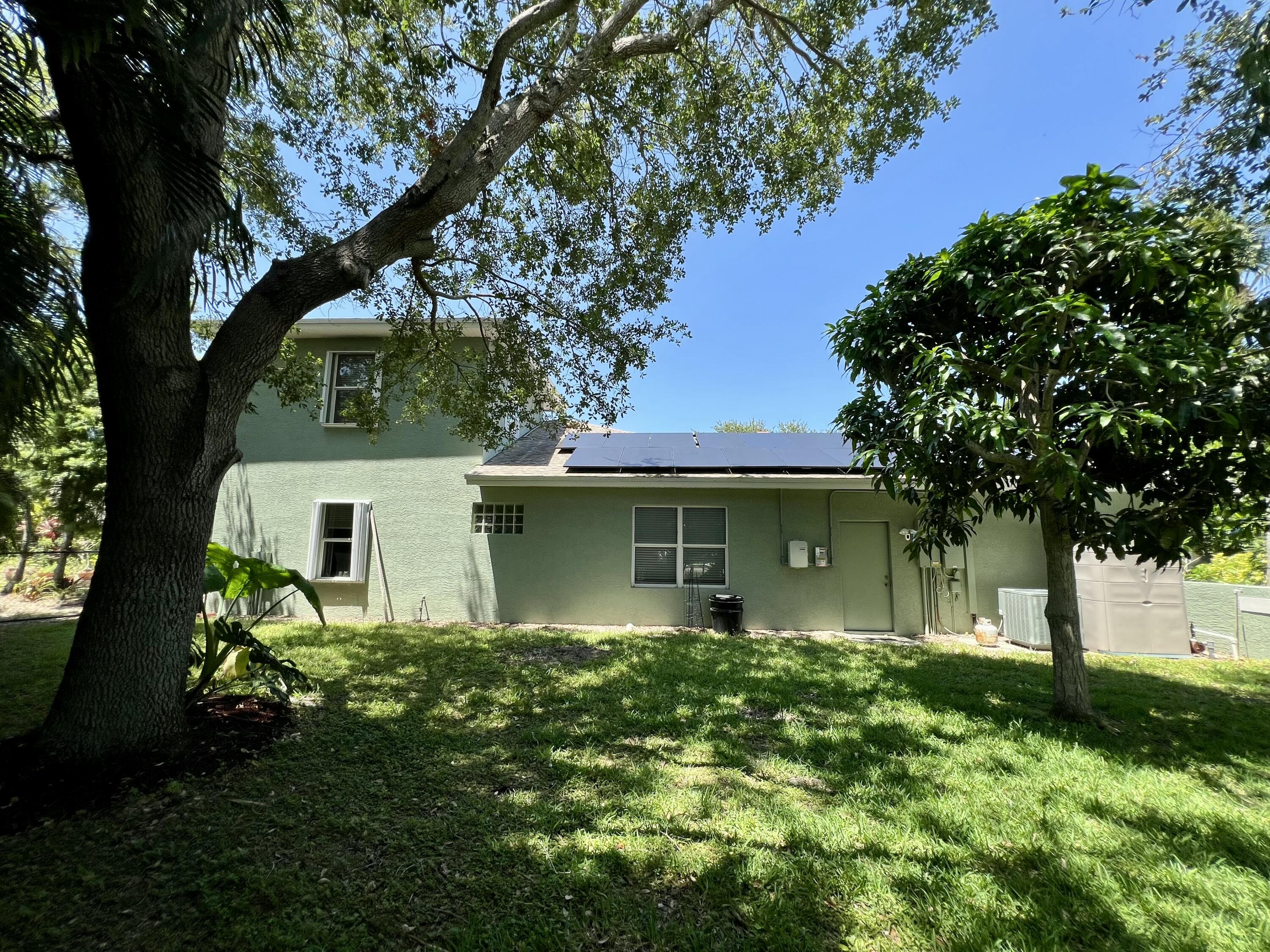 4292 Southeast Rainbows End Stuart, FL 34997 - Photo 7 of 56 rear of house 4292 se rainbow_2743