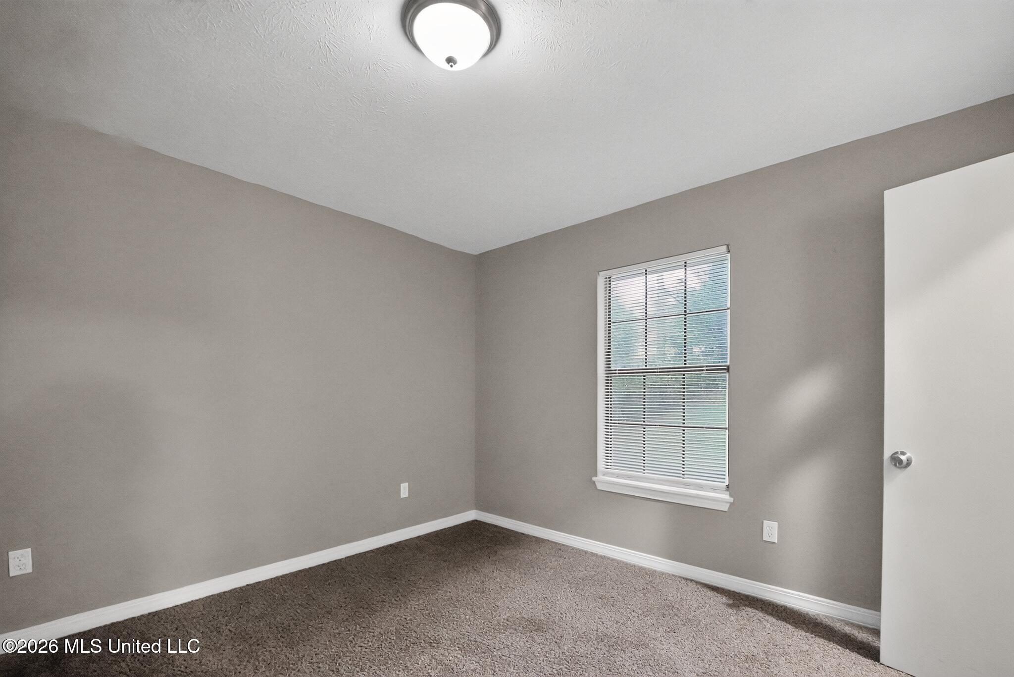 1407 Summit Avenue Jackson, MS 39212 - Photo 15 of 20 16_1407_Summit_Ave-Bedroom-8410