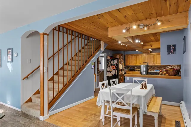 a view of a dining room with furniture