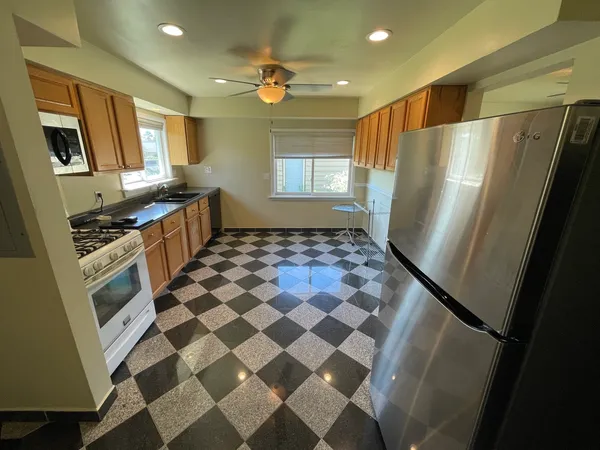 a black and white checkered floor with a black white checkered floor
