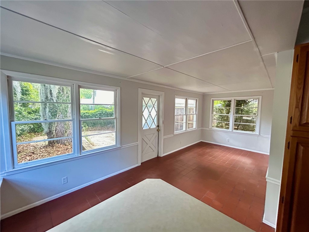 11822 Old Demere Road St. Simons Island, GA 31522 - Photo 5 of 15 Sunroom off Kitchen