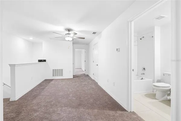 a view of a bathroom with a sink and a toilet