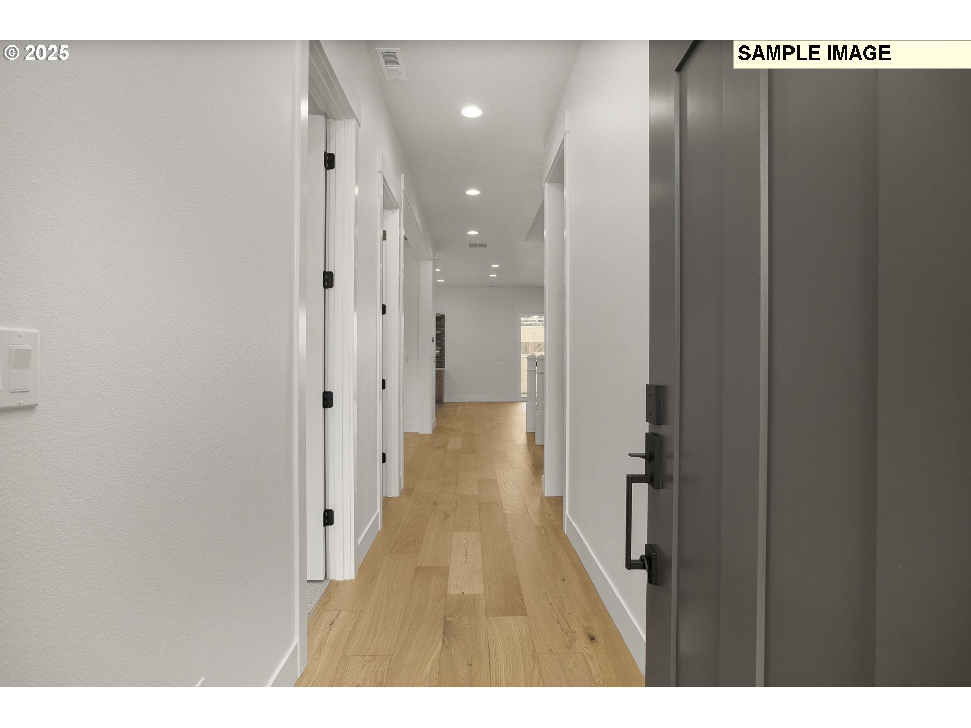 3780 Ridgewood Way West Linn, OR 97068 - Photo 4 of 28 a view of a hallway with wooden floor