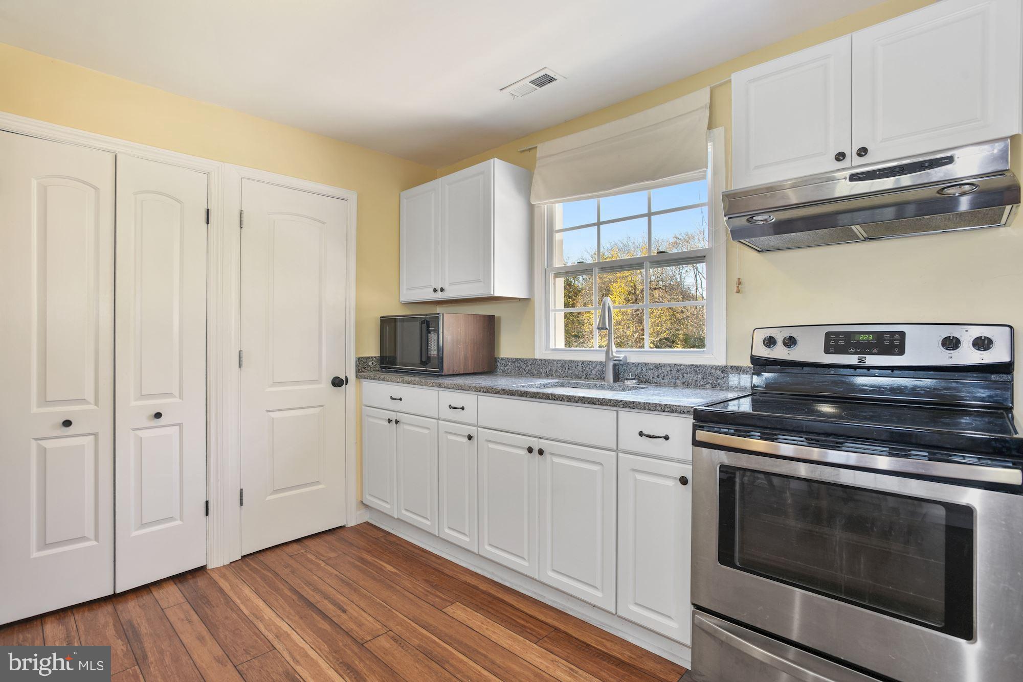 2950 Atoka Road Marshall, VA 20115 - Photo 16 of 29 Kitchen sink with view to backyard oasis