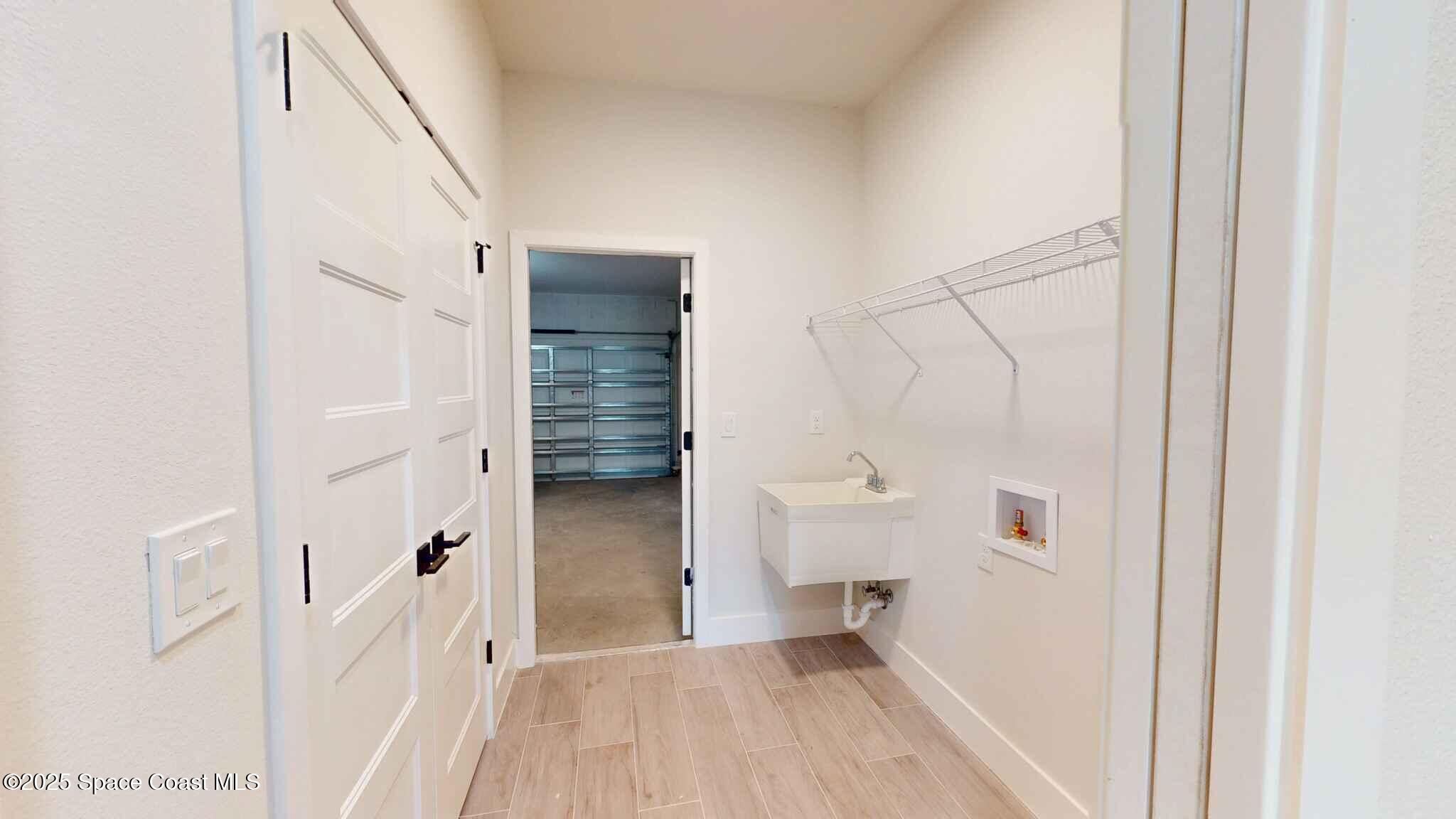 268 Barbarossa Road Northwest Palm Bay, FL 32907 - Photo 23 of 26 Laundry Room