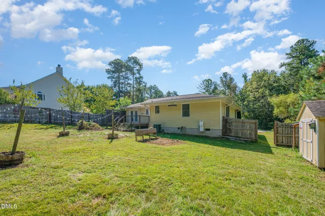 a house view with a garden space