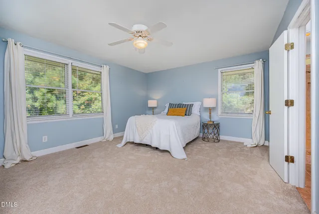 a kitchen with stainless steel appliances granite countertop a stove and a refrigerator