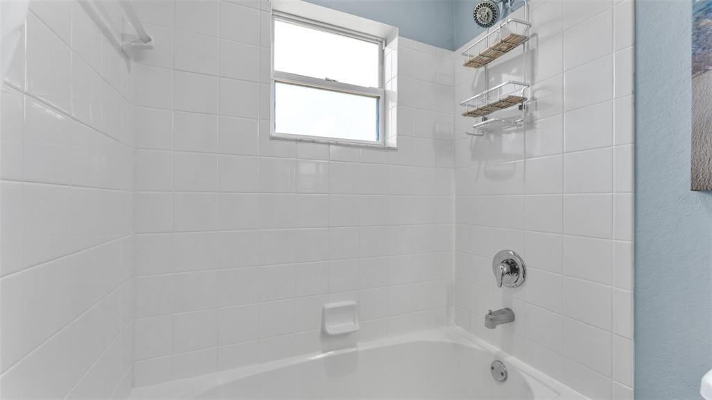 501 Interlock Street Lake Alfred, FL 33850 - Photo 36 of 49 a bathroom with a bathtub