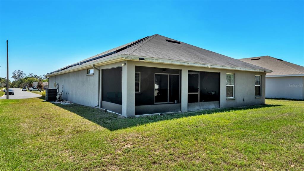 501 Interlock Street Lake Alfred, FL 33850 - Photo 39 of 49 a view of a yard in front of a house