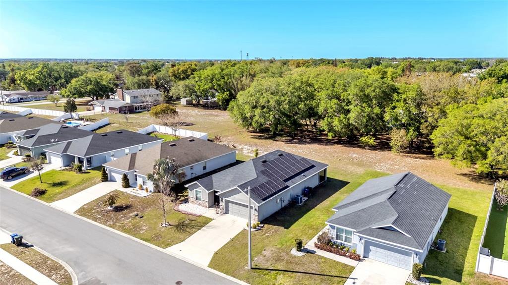 501 Interlock Street Lake Alfred, FL 33850 - Photo 44 of 49 a view of a swimming pool with lounge chairs