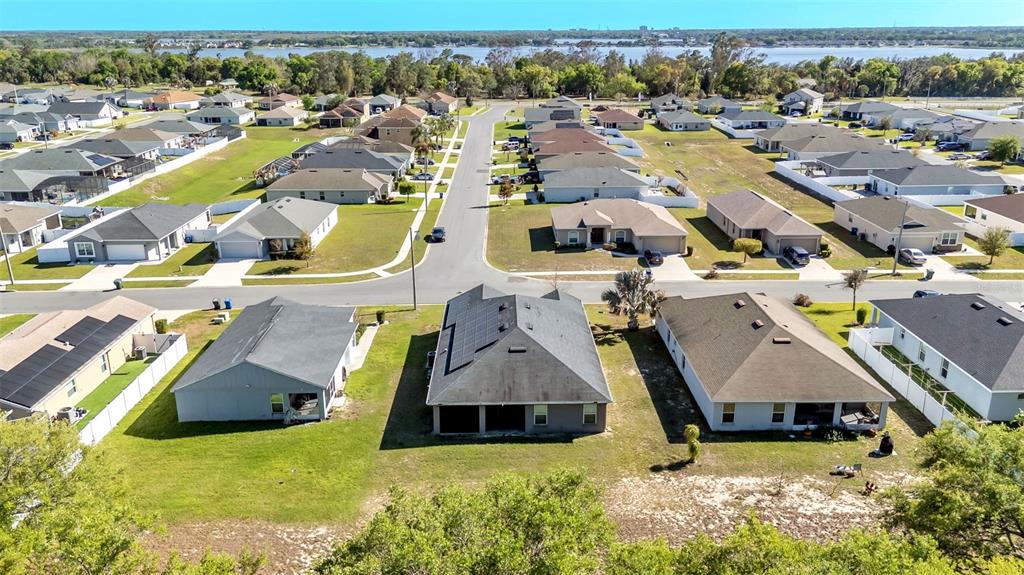 501 Interlock Street Lake Alfred, FL 33850 - Photo 46 of 49 an aerial view of a house with yard swimming pool and outdoor seating