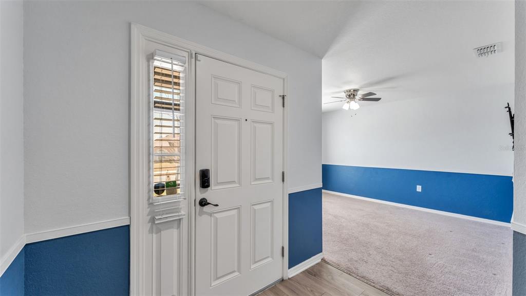 501 Interlock Street Lake Alfred, FL 33850 - Photo 5 of 49 an empty room with windows and closet