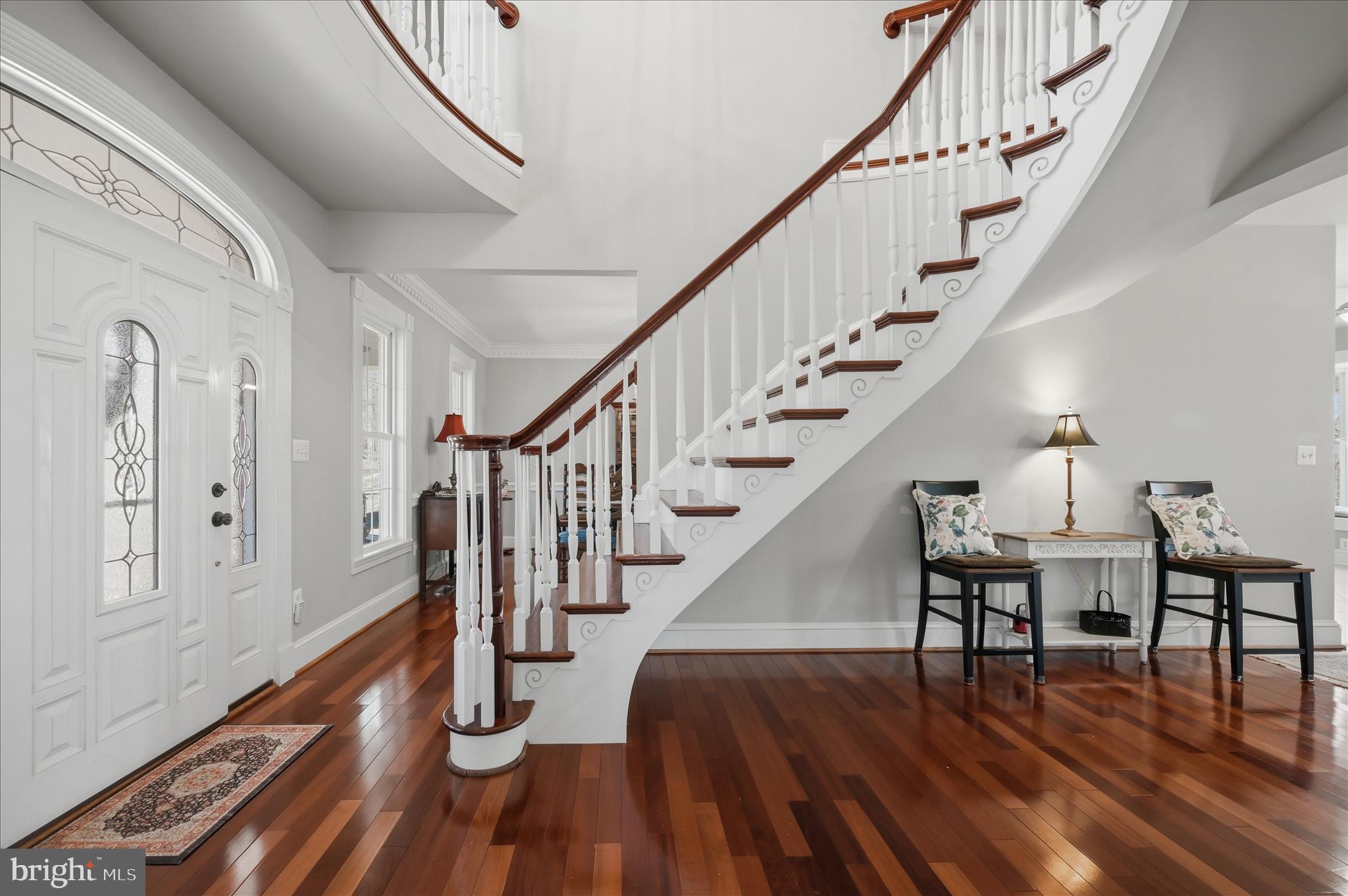520 Clagett Street Southwest Leesburg, VA 20175 - Photo 8 of 94 Foyer with Curved Floating Staircase