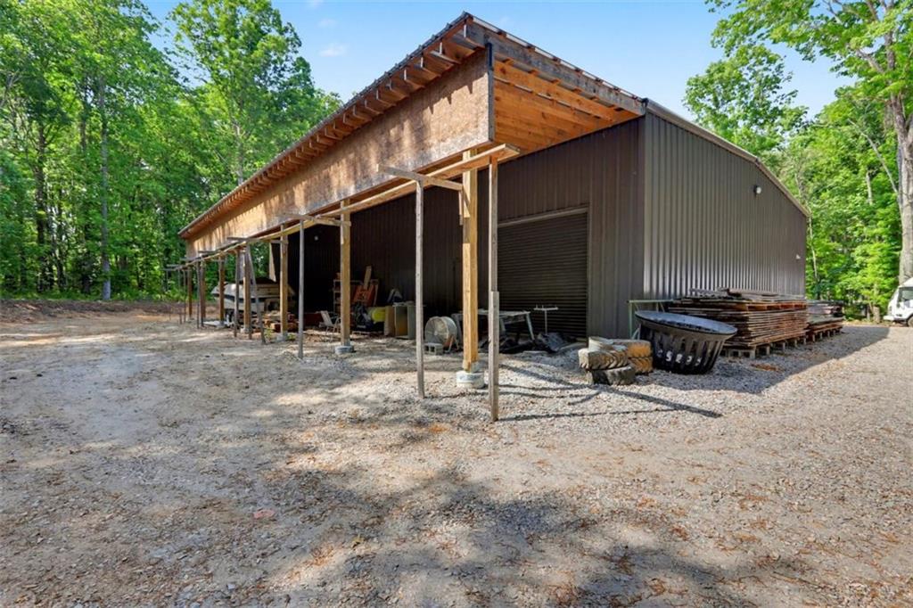 1110 Locklin Road Monroe, GA 30655 - Photo 11 of 14 a view of a house with backyard and sitting area