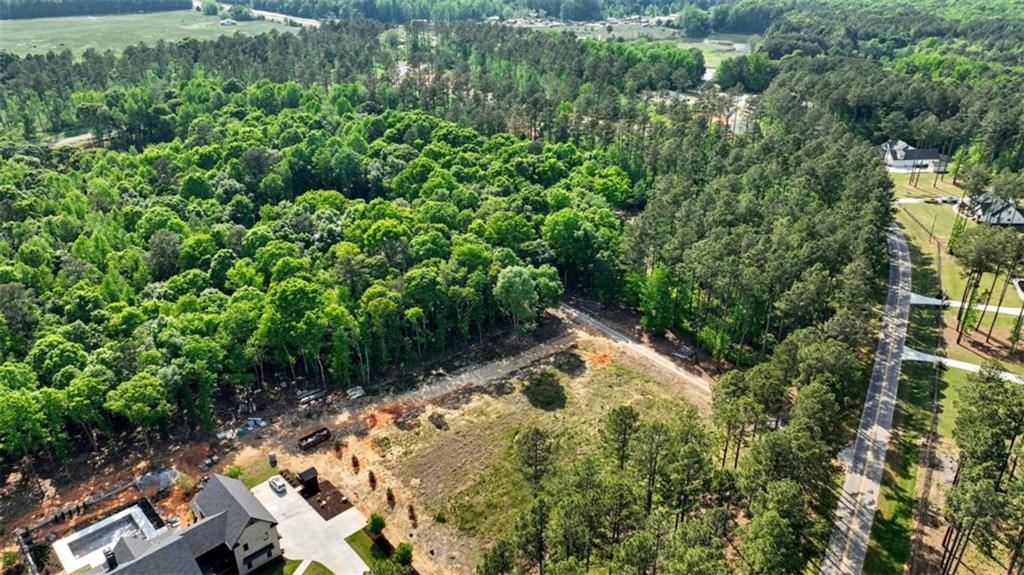 1110 Locklin Road Monroe, GA 30655 - Photo 13 of 14 an aerial view of residential house with outdoor space and trees all around