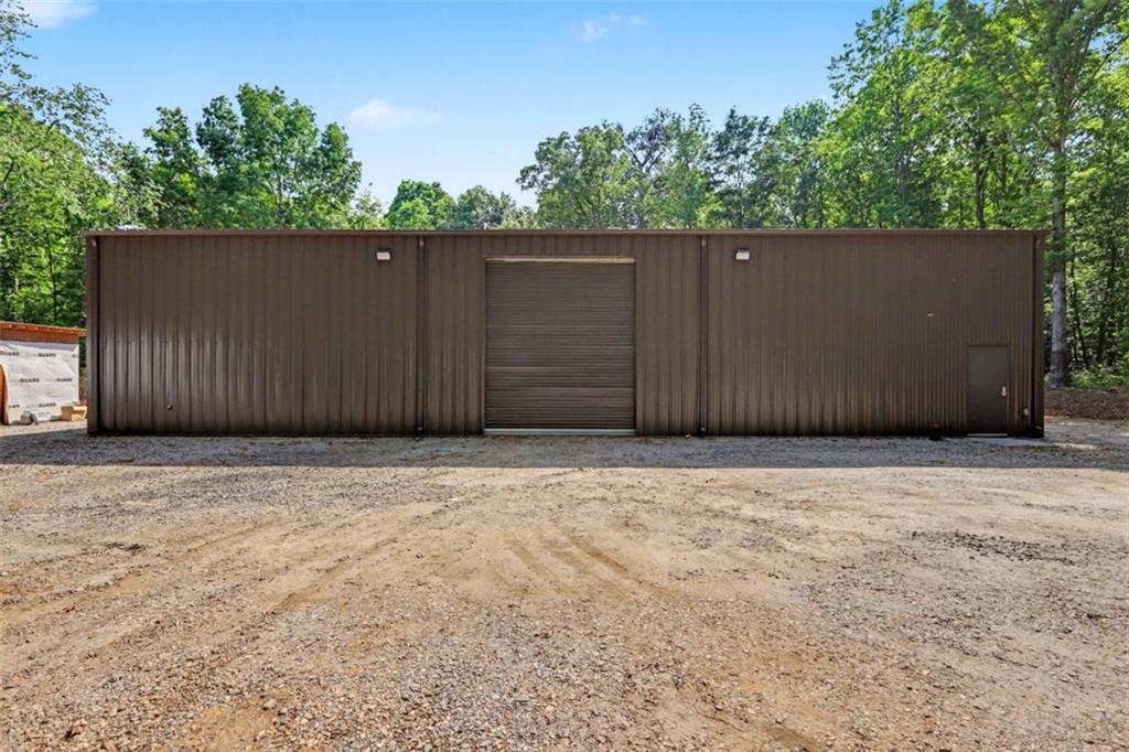 1110 Locklin Road Monroe, GA 30655 - Photo 7 of 14 front view of a house with a wooden fence