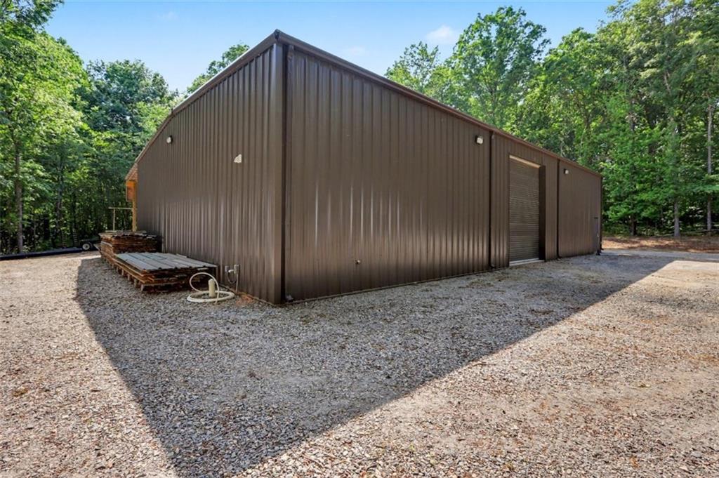 1110 Locklin Road Monroe, GA 30655 - Photo 8 of 14 a backyard of a house with lots of green space