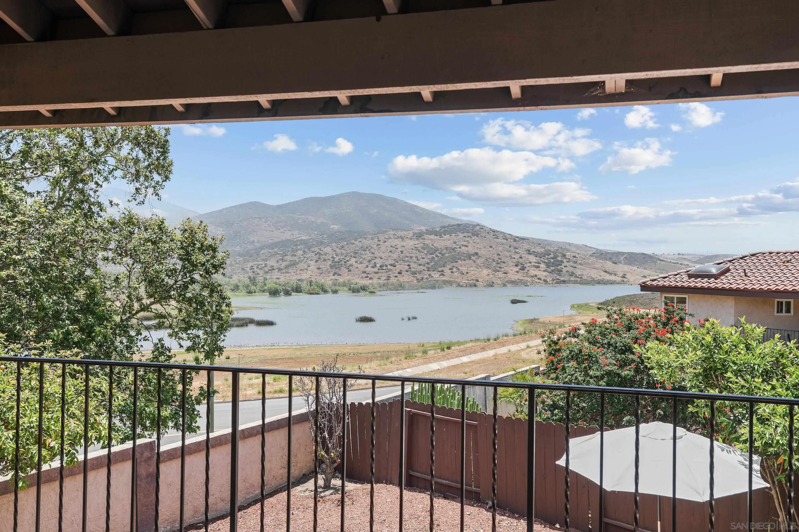 10015 Vallata Court Spring Valley, CA 91977 - Photo 15 of 33 a view of balcony with wooden floor and mountain view