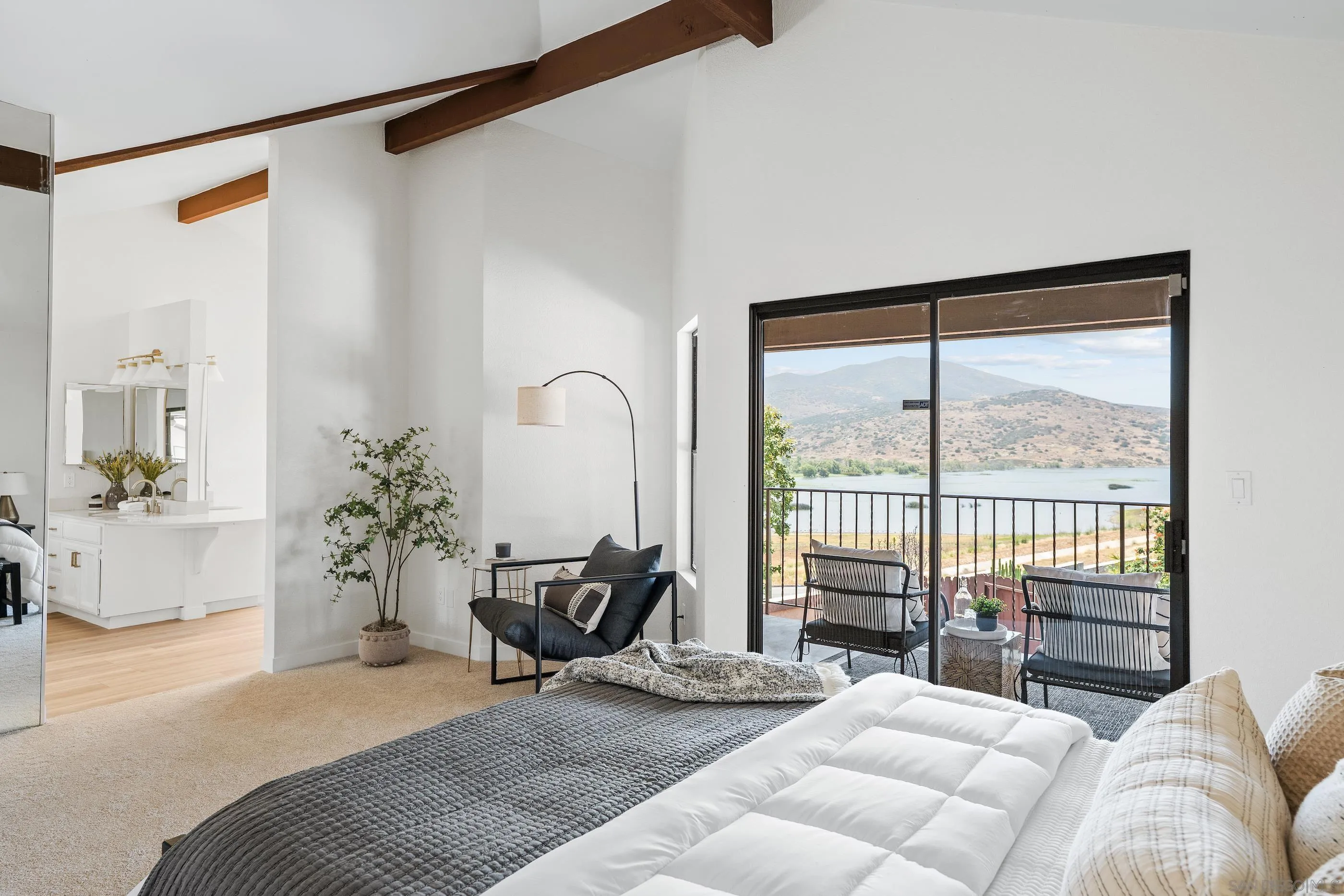 10015 Vallata Court Spring Valley, CA 91977 - Photo 19 of 33 a living room with furniture and a floor to ceiling window