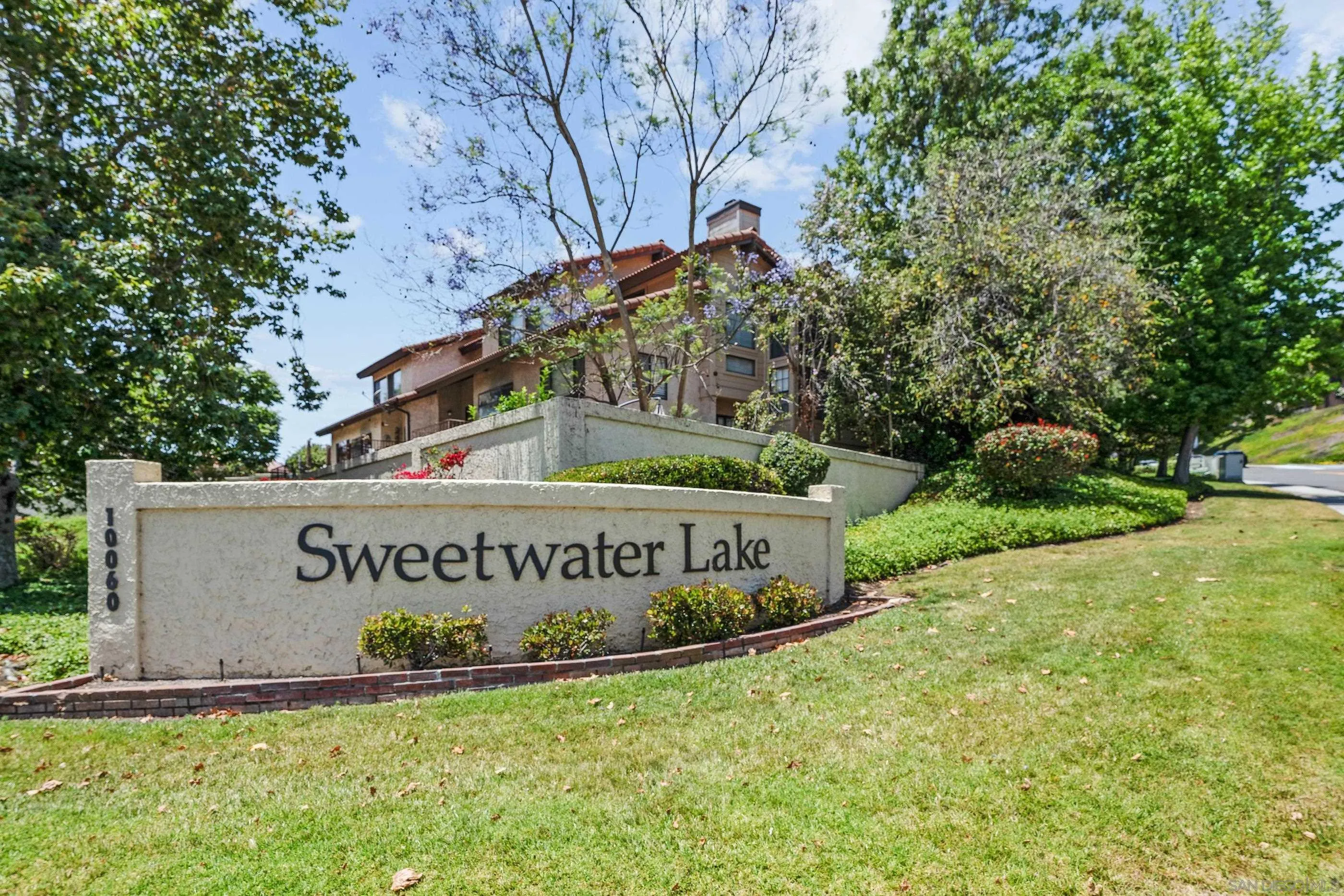 10015 Vallata Court Spring Valley, CA 91977 - Photo 28 of 33 a sign of golf club on a wall under a tree