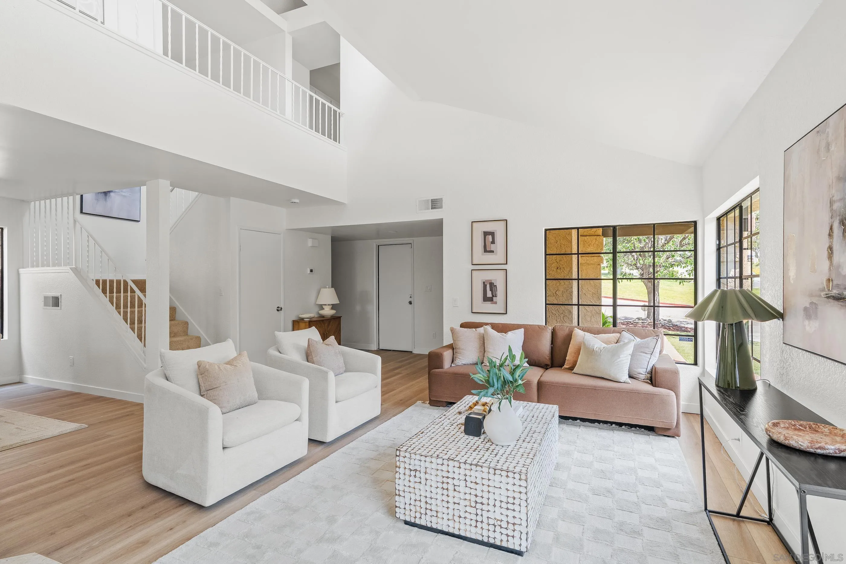 10015 Vallata Court Spring Valley, CA 91977 - Photo 3 of 33 a living room with furniture and a large window