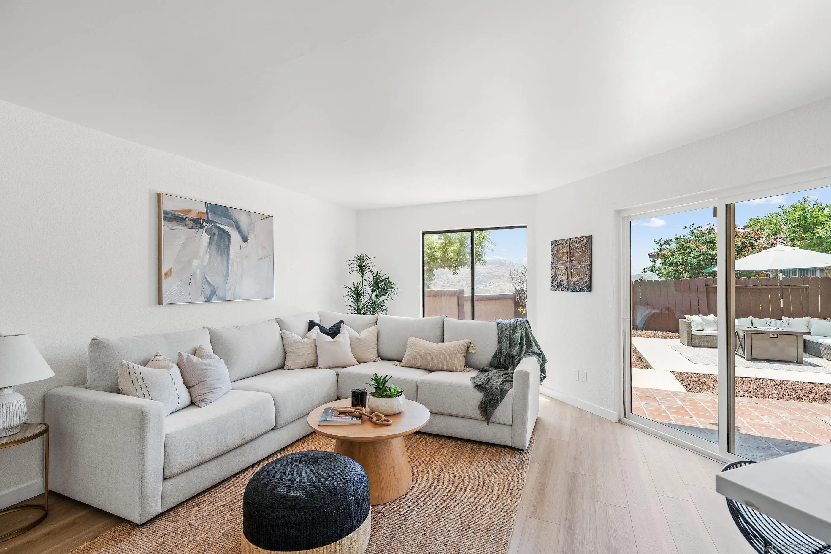 10015 Vallata Court Spring Valley, CA 91977 - Photo 9 of 33 a living room with furniture and a large window